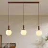 Lámpara colgante de mesita de noche para dormitorio, barra de bar de madera maciza y vidrio estilo retro americano, estilo wabi-sabi, lujo ligero, lámpara colgante pequeña de alta gama para comedor