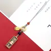 Acero de Titanio Mini Thangka Colgante para Teléfono Móvil Dios Amarillo de la Riqueza Zakiram Bolsa Pequeña con Colgante Thangka Joyería de Moda Colgante