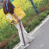 Bolso de mano tejido en PP con publicidad personalizada y bolsa de plástico de piel de serpiente para conciertos de Star Aidou.