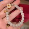 Nuevo brazalete de flor de durazno pequeño de celebridad en línea para mujer estilo antiguo ins estudiante lujo ligero diseño de nicho alto sentido regalo para amigas