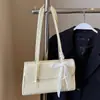 Bolsa de Ombro Feminina Simples Coreana Estilo Doce de Leite Venda Quente Primavera/Verão Moda Versátil Alta Qualidade Versátil de Ombro Único