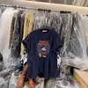 Camiseta de Manga Curta Estampada Cartoon Retro Coreana de Verão para Mulheres Nova Solta Estilo Preguiçoso Versátil Gola Redonda Top