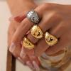Anillo de estilo británico retro con personalidad de nicho, de cara ancha, ligero, de lujo, elegante, con diseño de diamantes, de acero de titanio chapado en oro.