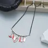 Collar con múltiples colgantes de hacha simulada retro oscuro transfronterizo europeo y americano para mujer, pulsera creativa de gota de sangre roja exquisita y única