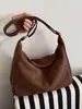 Bolso de gamuza de invierno 2026 nuevo diseño de moda versátil bolso de hombro cruzado casual gran capacidad para el trabajo bolso de axila