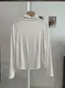 KEKEZOON Cuello semialto hombro normal corte ajustado favorecedor color liso manga larga prenda interior camiseta básica top venta al por mayor 8912