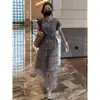 Falda de pastel estilo tweed Traje de moda 2025 Nuevo de verano Vestido de verano Estilo caliente de alta gama Dos piezas que reducen la edad Traje de mujer