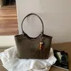 Bolso tote para mujer, nueva colección otoño/invierno 2026, elegante y versátil, con un toque de alta gama, gran capacidad, adecuado para ir al trabajo y diseñado como bolso de axila o bolso de hombro