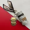 Ovelha de dinheiro em folha de ouro 999, flor de dinheiro, ovelhinha com ouro, pingente de bolsa tipo balde, chaveiro, presente para evento de reunião anual da empresa