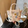 Bolsa feminina de nicho de alta qualidade transfronteiriça 2026 nova moda bolsa tiracolo estampada, bolsa de balde de mão super popular