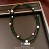 Collar transfronterizo de cuentas de vidrio redondas multicapa y perlas, cadena para la clavícula de lujo ligero de nicho, accesorio de moda estilo vintage