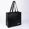 Bolsa de Viagem Universal Personalizável com Fundo e Lados Pretos Serigrafados e Revestimento de Filme Não Tecido Personalizável