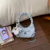 Bolsa de Mão Plissada de Nicho Estilo Coreano com Laço Design em Forma de Nuvem para Mulheres, Novo Modelo Primavera 2026, Bolsa de Ombro Único Transversal Formato Dumpling