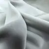 Poliéster satén cepillado color durazno tela para ropa y textiles del hogar poliéster satén piel de durazno cepillada tela para pantalones de playa venta al por mayor