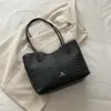 Bolso de mujer transfronterizo de gran capacidad, nueva colección otoño 2026, bolso de hombro versátil y a la moda, bolso tote moderno y casual para el trabajo y el uso diario