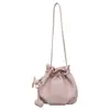 Bolsa balde de mão popular estilo coreano para mulheres deste ano, novidade de verão 2026, bolsa de ombro única com cordão de cor sólida, bolsa transversal versátil