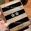 Atacado do Fabricante: Brincos de Floco de Neve Verde Naturais do Xiaohongshu com Inlay de Prata S925, Design Fresco e Versátil