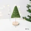 A nova decoração de Natal transfronteiriça da NUCHI é um enfeite de mini árvore de Natal em feltro de lã para exibição em mesa, um presente de Natal