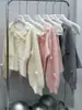 Nuevo Estilo Otoño/Invierno 2026 Suéter de Punto Ajustado con Flores Tridimensionales + Falda Conjunto de Dos Piezas Estilo Dulce para Mujer