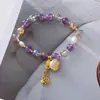 Pulsera de aleación con colgante de carácter "Fu" de perla de cristal natural más vendida, moderna y de alta gama, adecuada para el uso diario de mujeres