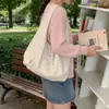 2026 Nuevo Bolso Tote de Lunares Transfronterizo para Mujer, Bolso de Hombro de Gran Capacidad para el Trabajo, Estilo Universitario de Moda de Comercio Exterior, Diseño Sencillo