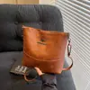 Bolsa de Balde Nova Retro Transfronteiriça Grande Capacidade Casual Simples Bolsa Transversal Versátil para o Dia a Dia Bolsa de Ombro Feminina Comércio Exterior