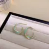 Pendientes de Tornillo Retorcidos Esmaltados con Goteo de Aceite Estilo Coreano Chapados en Oro Cobre para Mujer, Nuevos Pendientes de Botón de Moda Trendy de Lujo Ligero de Nicho con Temperamento