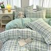 Juego de cama de cuatro piezas de algodón lavado fresco pequeño grueso para lijar funda nórdica funda de almohada ropa de cama de tres piezas para dormitorio de estudiantes