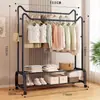 Perchero de pie para uso en dormitorio, almacenamiento para colgar ropa en casa, tendedero y perchero simple, colgador de ropa plegable para interiores, venta al por mayor