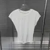 Estilo Caliente Nuevo Primavera 2026 Camiseta de Manga Corta Hueca para Mujer + Conjunto de Falda