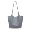 Bolso de hombro vintage de gran capacidad con un toque de alta gama, bolso tote versátil para el trabajo para mujer, bolso de patrón tejido de nicho, nuevo modelo para mujer