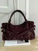 Nueva bolsa de motocicleta de nicho de Shuai Mi, elegante bolsa de hombro para debajo del brazo para mujer, bolsa de mano para el día a día con tachuelas de gran capacidad