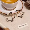 Pendientes Retro Estilo Hong Kong Otoño e Invierno Estampado Leopardo Estrella de Cinco Puntas para Mujer, Estilo Dulce y Fresco Sexy, Pendientes de Estrella de Moda y Versátiles