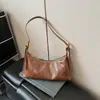 Bolso Versátil Estilo Francés para Debajo del Brazo para Mujer Verano 2025 Nicho Retro Simple Color Sólido Bolso de Hombro Cruzado para Viajes