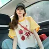 Camiseta de Manga Corta Raglán con Bloques de Color a Cuadros Azules para Mujer, Verano 2026, Estampado de Dibujos Animados Único y Exquisito, Corte Holgado, Top Favorecedor