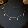 Canción de Amor Aurora~Collar con Colgante de Estrella Hueca de Circonita Super Brillante y Borla Cadena de Clavícula Chapada en Oro Real de 18K para Mujer