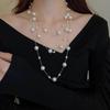 Collar de perlas largas de moda de lujo ligero de Corea del Sur para mujer, temperamento Joker, cadena de suéter de alto sentido, collar de otoño e invierno al por mayor