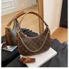 Bolso de mujer elegante transfronterizo 2026 nuevo modelo Bolso baguette estampado retro europeo y americano bolso de hombro de alta gama a la moda bolso cruzado