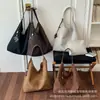 Moda Coreana e Japonesa simples grande capacidade para o dia a dia 2026 feminina inverno nova alta qualidade bolsa de ombro bolsa tote