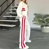 Outono 2026 Moda Casual Esportiva Europeia e Americana Nova Feminina Conjunto de Moletom Listrado Solto e Calças de Cintura Alta