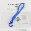 Nuevas y coloridas correas para teléfono de cordón trenzado hechas a mano, bolsos para muñecas, llaveros, accesorios DIY y adornos decorativos - al por mayor