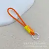 Lanyard tejido anudado de color a juego al por mayor para funda de teléfono móvil, llavero corto creativo DIY, muñeco de peluche, correa anti-pérdida