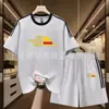 Conjunto deportivo para correr absorbente de sudor para hombre, conjunto moderno de shorts y camiseta de manga corta, traje deportivo de verano de algodón puro con tres rayas, disponible para dropshipping