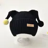 Chapéu infantil coreano outono e inverno chapéu de proteção de ouvido quente chapéu de letra moda bebê moda malha pulôver chapéu de lã