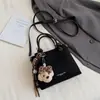 Bolso Cubo Portátil Retro de Nicho Transfronterizo para Mujer Nuevo Otoño e Invierno 2025 Bolso de Hombro Único Cruzado Bolso de Hombro Cruzado Informal de Moda para Viajar