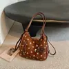 Bolsa feminina de alta costura vintage descontraída, nova bolsa de ombro para o outono de 2026, bolsa tote de ombro moderna para o dia a dia
