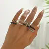 Anillo de Arroz de Vidrio de Color Mixto Transfronterizo Europeo y Americano Anillo Elástico Anillo de Arroz de Moda Personalizado Juego de 8 Piezas