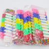 Venta al por mayor del fabricante Silbatos de plástico de colores Juguetes de puesto callejero para niños Silbatos de árbitro para competiciones de aficionados con cordón para uso en fútbol