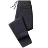 Pantalones casuales versátiles de pana para hombre para invierno, forrados de polar, engrosados, cálidos, pantalones deportivos, pantalones casuales de primavera y otoño para hombre