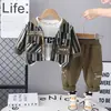Fabricantes Mayoristas de Ropa de Primavera de Manga Larga para Niños Transfronterizos Conjunto de Tres Piezas Cardigan Rayado Elegante para Niño Nuevo Estilo Primavera y Otoño 2025